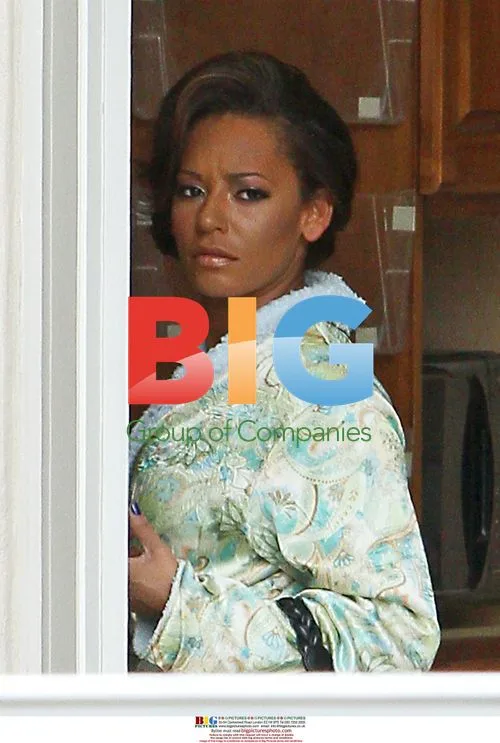 Melanie B Spotted in Green Robe