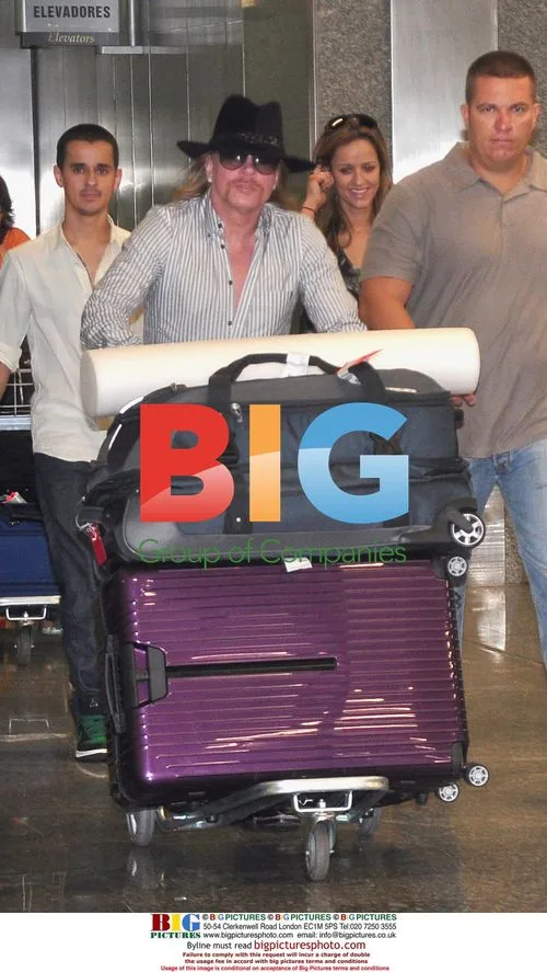 Axl Rose Arrives at Rio Airport