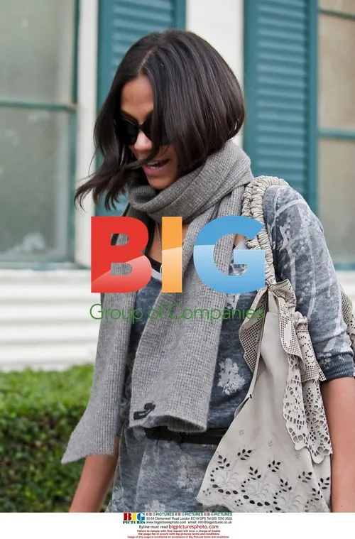 Zoe Saldana Emerges From Oscar Dress Fitting