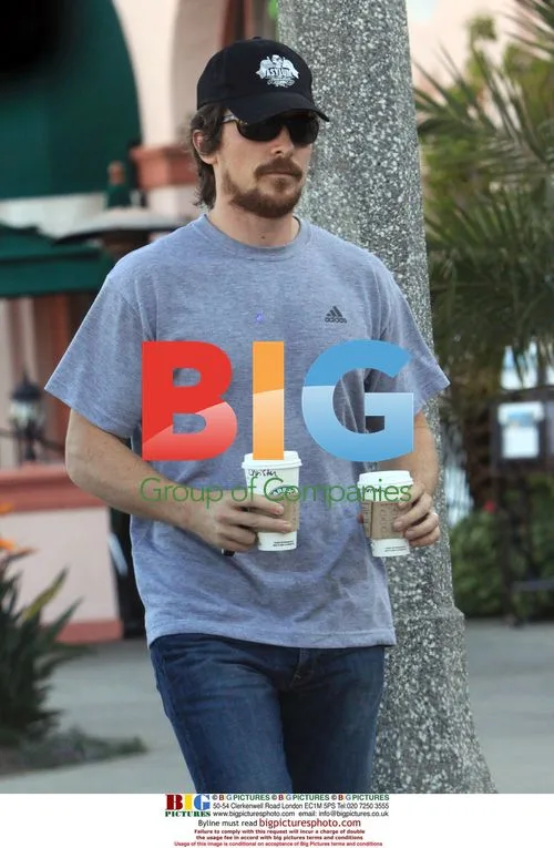 Christian Bale Picks Up Daughter