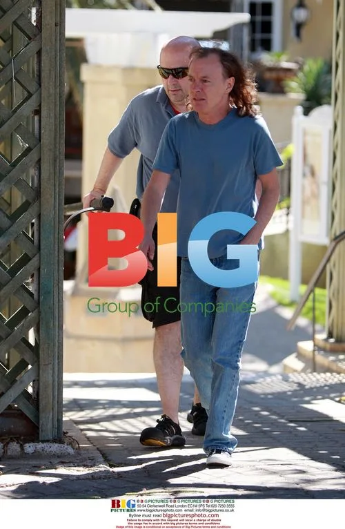 Angus Young Greets Fans in Perth