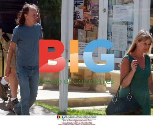 Angus Young Enjoys Lunch with Wife in Perth