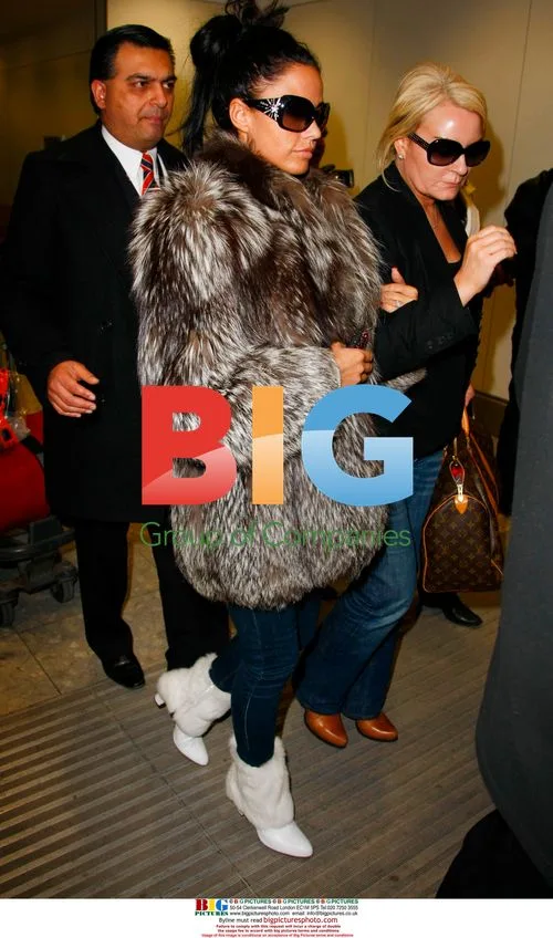Katie Price Arrives at Heathrow