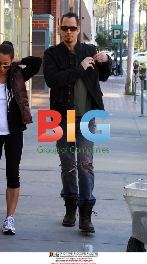 Chris Cornell and Wife Feeding Meter