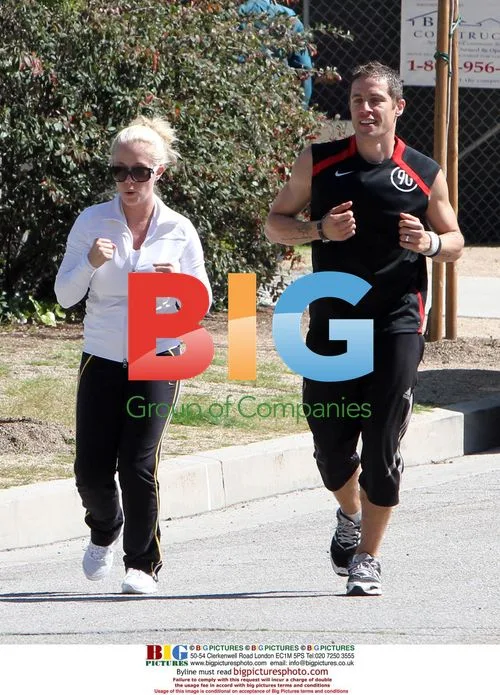 Kendra Baskett Jogging with Trainer