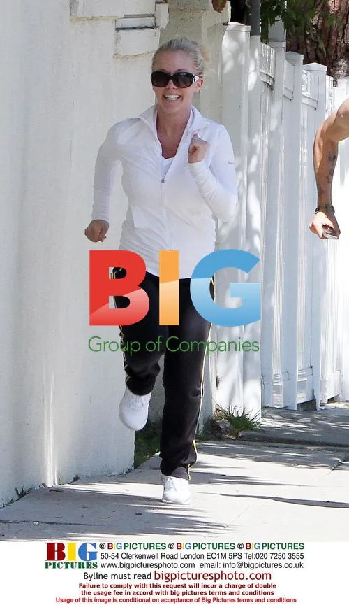 Kendra Baskett Jogs with Trainer