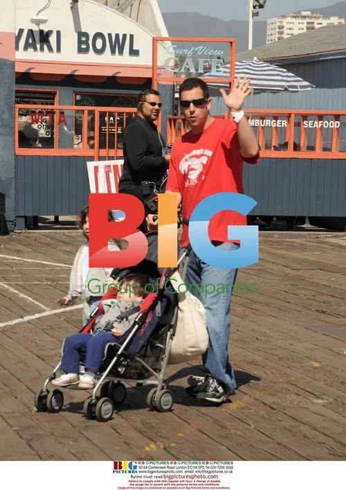 Adam Sandler with children at Make-A-Wish event
