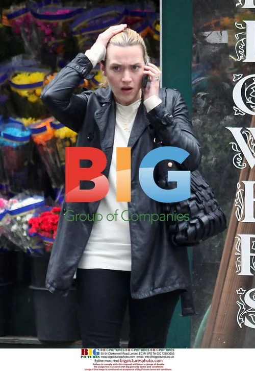 Kate Winslet Spotted in NYC Rain