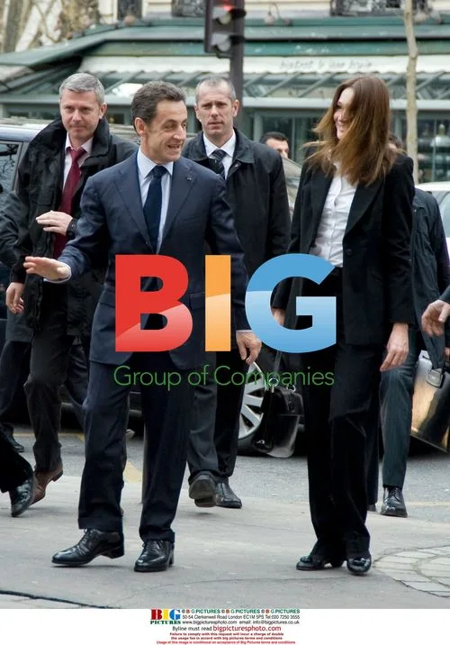Sarkozy and Bruni go to vote