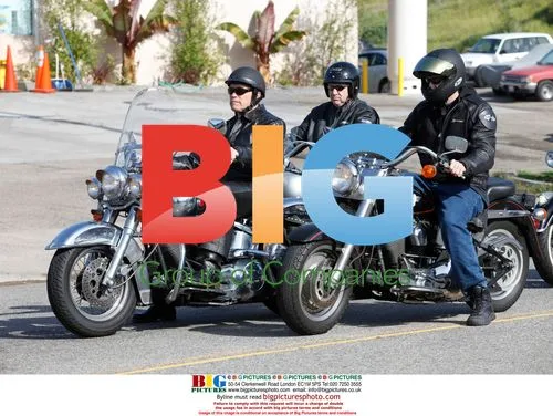 Arnold Schwarzenegger on Motorcycle