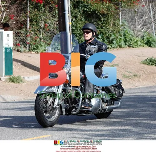 Arnold Schwarzenegger on Motorcycle