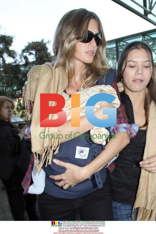 Gisele and son Benjamin at LAX