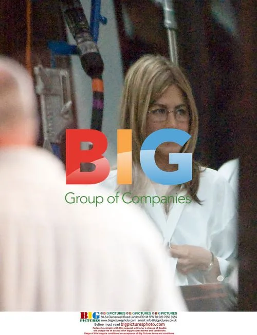 Jennifer Aniston and Adam Sandler on set