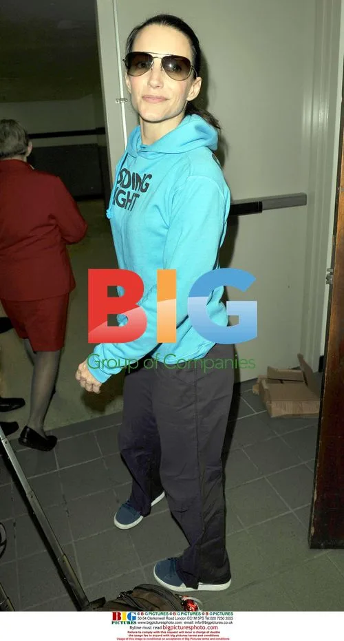 Kristen Davis Wearing Blue Sweatshirt at LAX