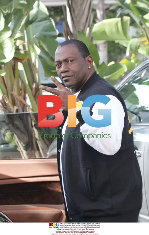 Randy Jackson shops for kicks with driver