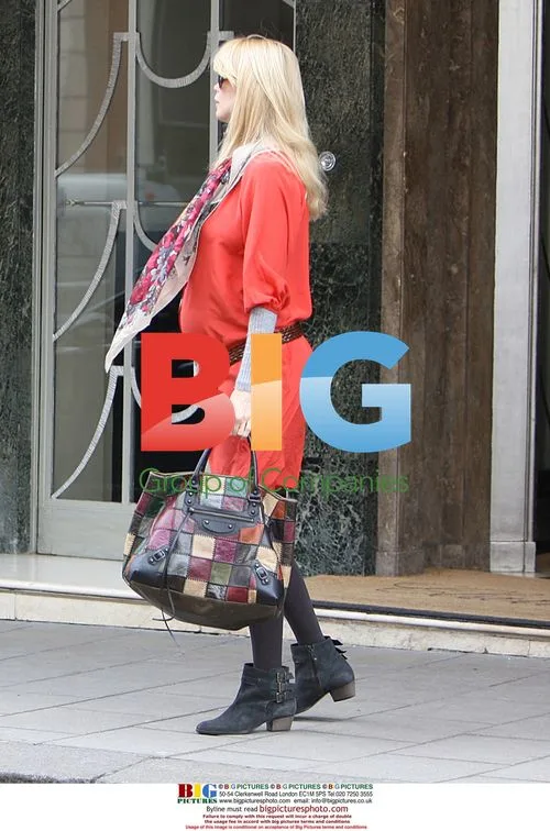 Claudia Schiffer Leaving London Hotel