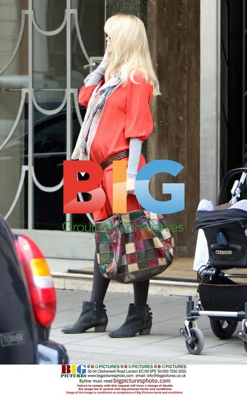 Claudia Schiffer Leaving Hotel