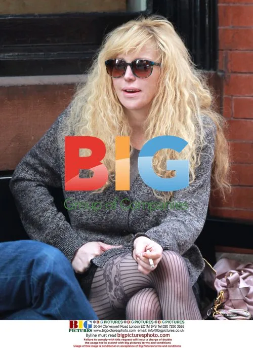 Courtney Love Smokes with a Friend in NYC