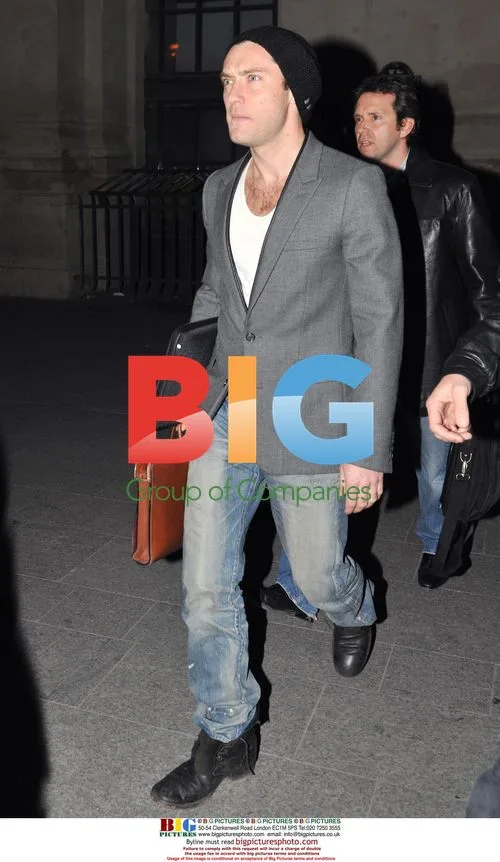 Jude Law Arrives in Paris