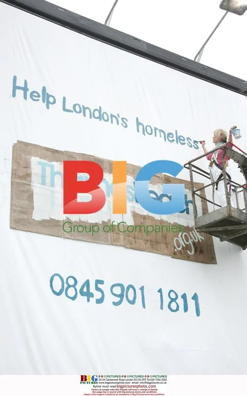 Joanna Lumley Paints Billboard for Homeless