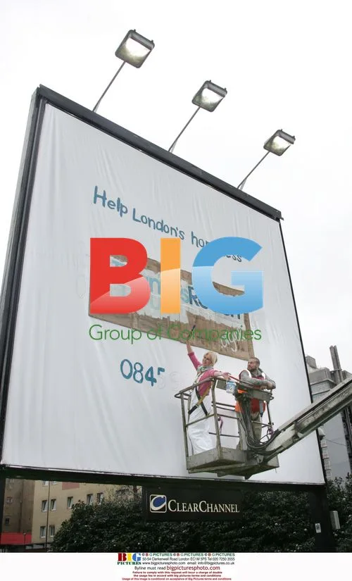 Joanna Lumley Paints Homeless Charity Billboard