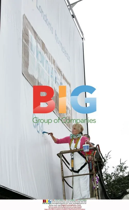 Joanna Lumley Paints Homeless Charity Billboard
