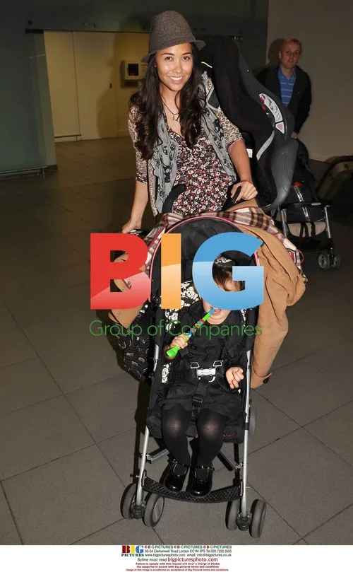 Myleene Klass Departs Gatwick with Daughter