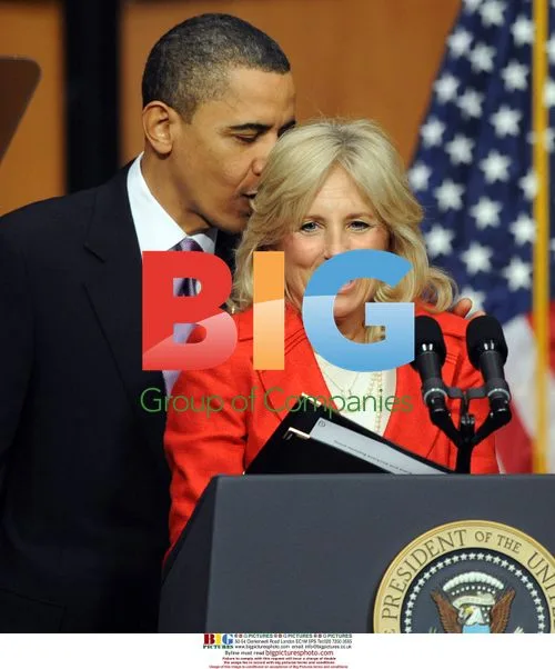 Obama Kisses Dr. Jill Biden at Health Care Act Signing