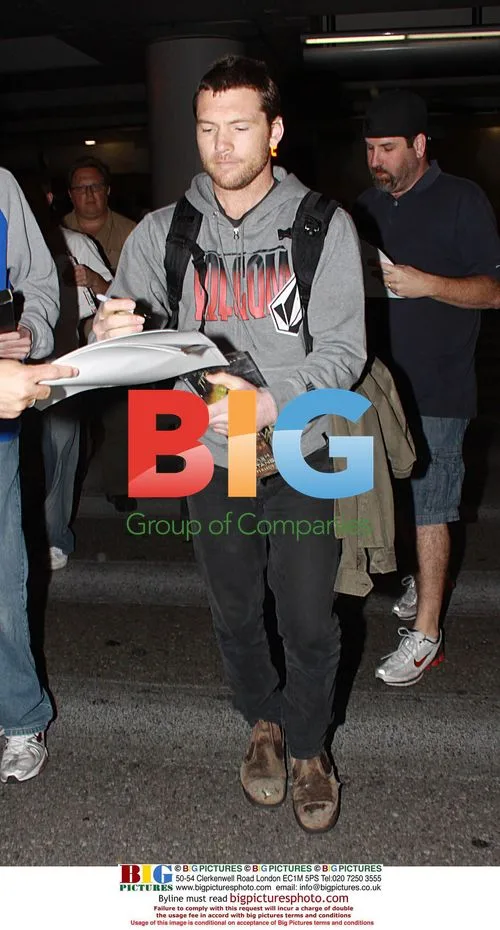 Sam Worthington Arrives at LAX
