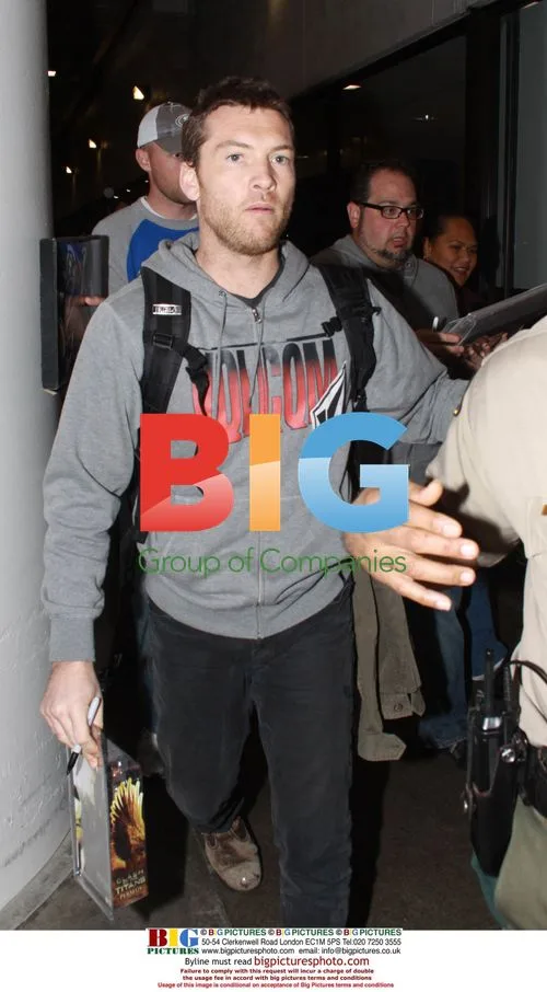 Sam Worthington Arrives at LAX