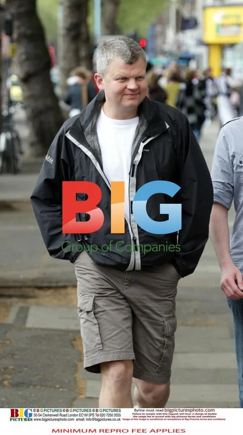 Adrian Chiles Strolls with Friends in London