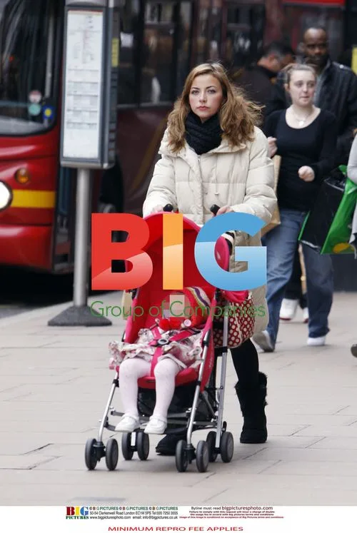 Charlotte Church with Baby and Red Pram in London