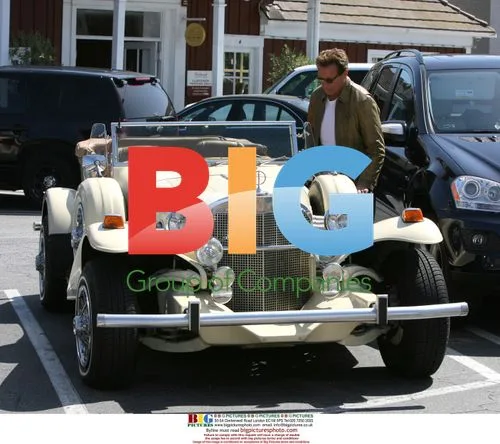Arnold Schwarzenegger Driving Vintage Car