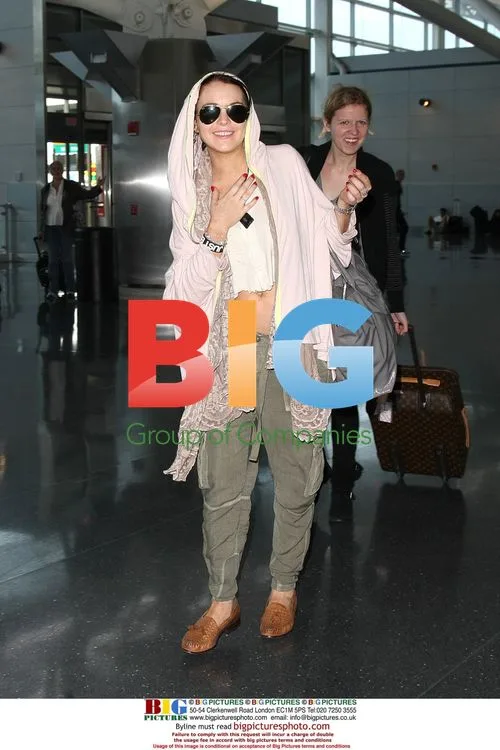 Lindsay Lohan and Dina Lohan at JFK