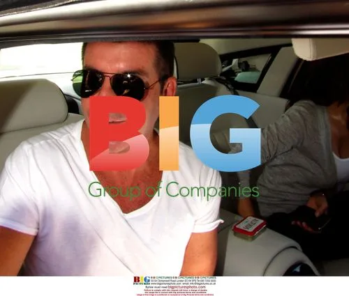 Simon Cowell and Mezhgan Hussainy greet fans in LA