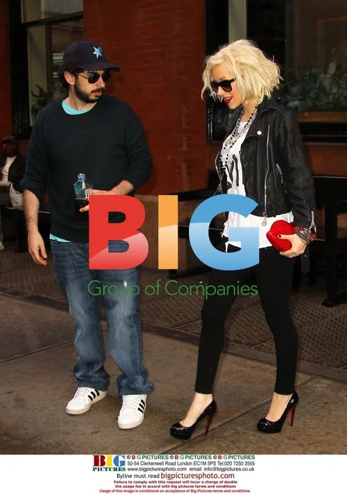 Christina Aguilera Leaves Hotel with Husband