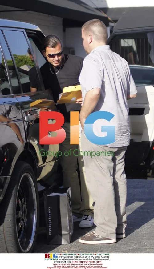 Gavin Rossdale Shopping at Armani Exchange