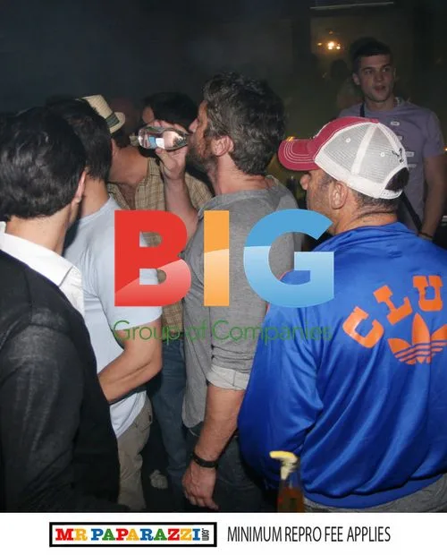 Gerard Butler Spotted with Mystery Woman