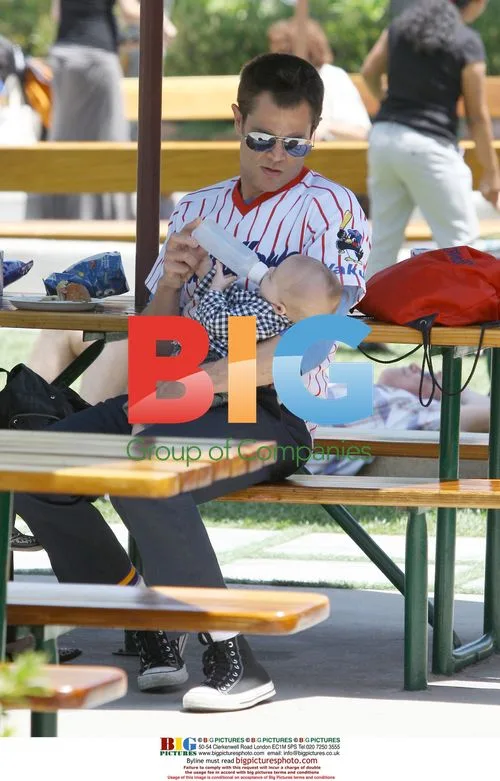Johnny Knoxville Feeding Baby Rocko in Malibu