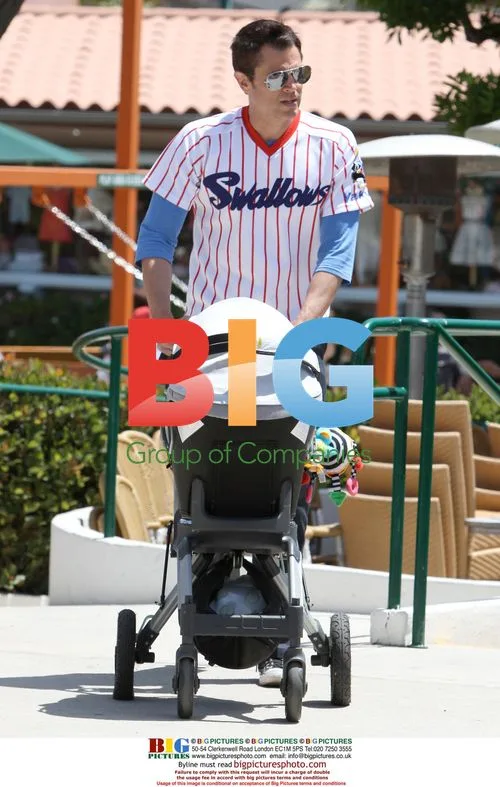 Johnny Knoxville Feeding Baby Rocko in Malibu