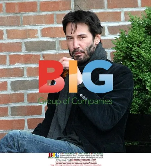 Keanu Reeves Spotted Drinking Outside Hotel