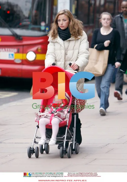 Charlotte Church with Baby and Red Pram
