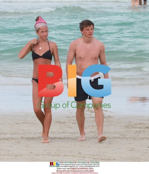 Andrei Arshavin and wife at beach