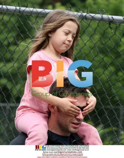 Hugh Jackman Carries Daughter Ava Home
