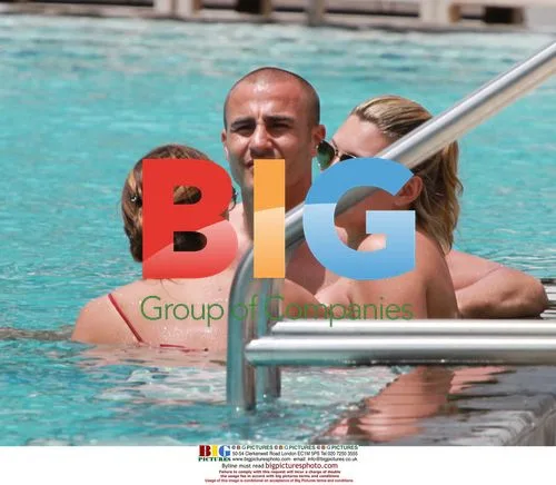 Fabio Cannavaro relaxes by pool in Miami