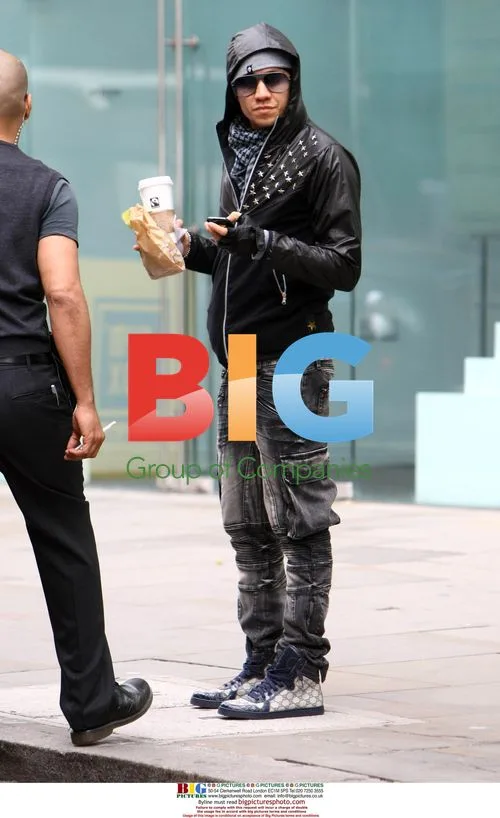 Taboo of Black Eyed Peas Grabs Coffee in London