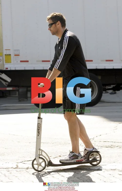 Hugh Jackman Family on Scooters
