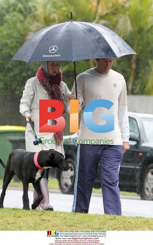 Glenn McGrath and Sara Walk Rescue Dog