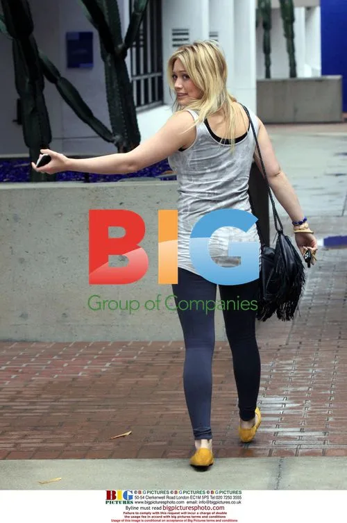 Hilary Duff Leaving Studio in Rain