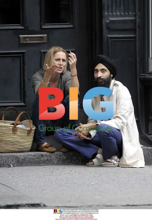 Designer Waris and girlfriend in West Village